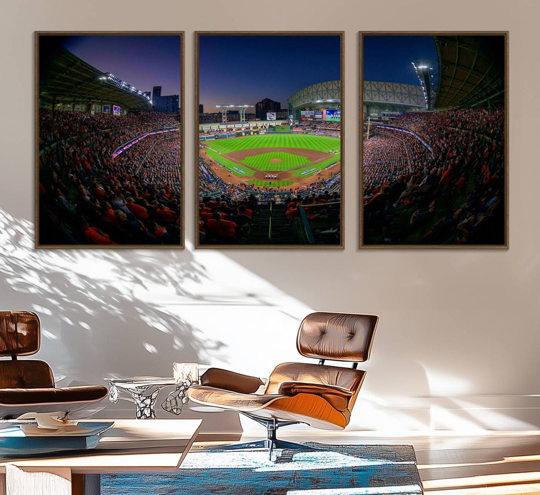 A canvas print of Houston Minute Maid Park at dusk is mounted on the wall.