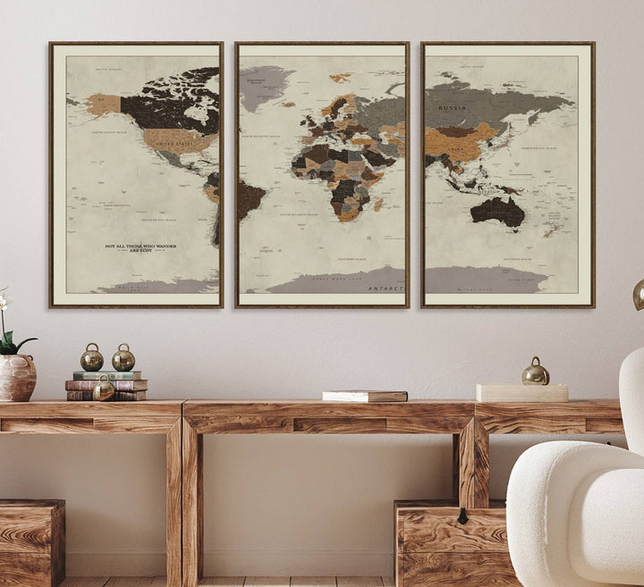 A vintage world map on beige canvas, featuring countries in brown and black shades.