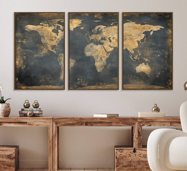 The Grunge World Map Canvas Wall Art features golden tones and is displayed against a white-paneled wall.