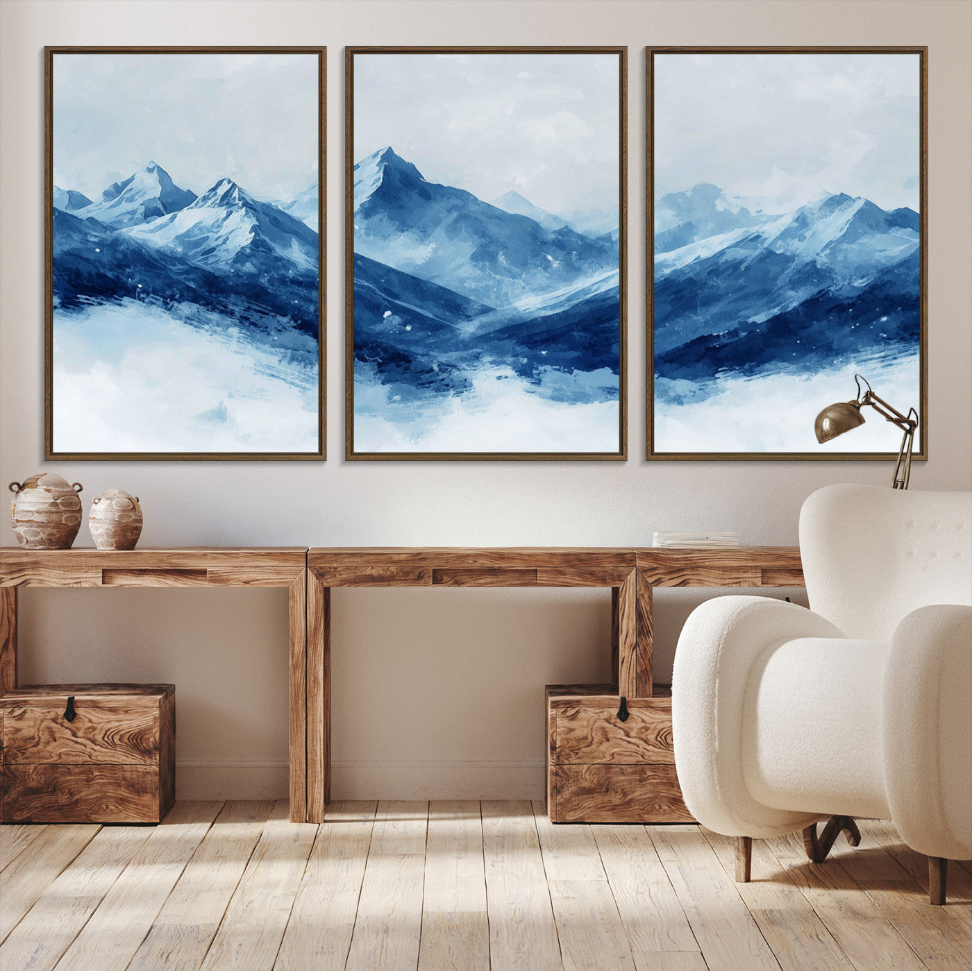 Peaceful watercolor-style painting of snowy blue mountains in soft tones, perfect for winter-themed or minimalist wall decor.