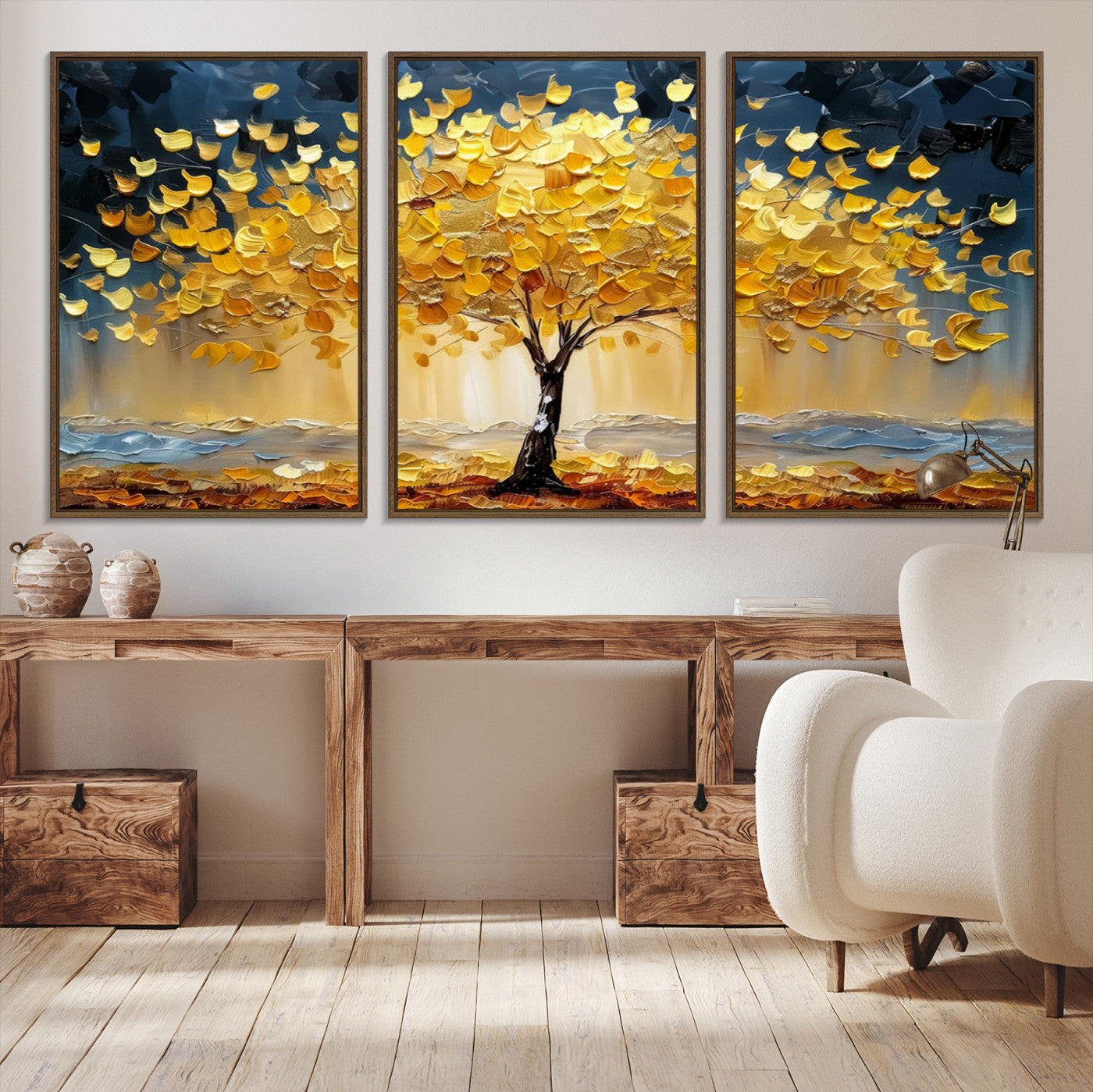 Canvas of a golden autumn tree with textured brushstrokes and moody blue skies, perfect for dramatic and vibrant home decor.