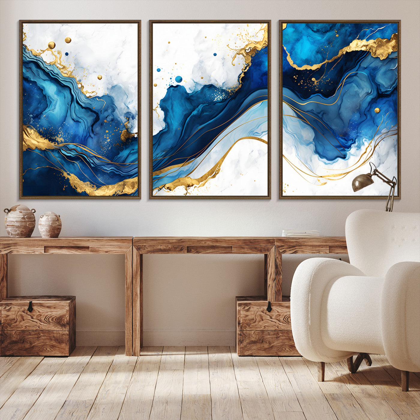 Elegant abstract canvas in cobalt blue and gold tones, featuring marble waves and fluid motion, ideal for luxe interior styling.