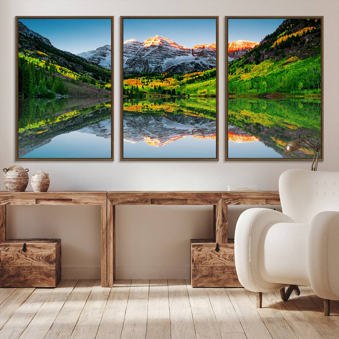 The Sunrise Maroon Bells Lake Wall Art Print beautifully captures North Maroon Peak mirrored in the tranquil lake, framed by lush greenery.