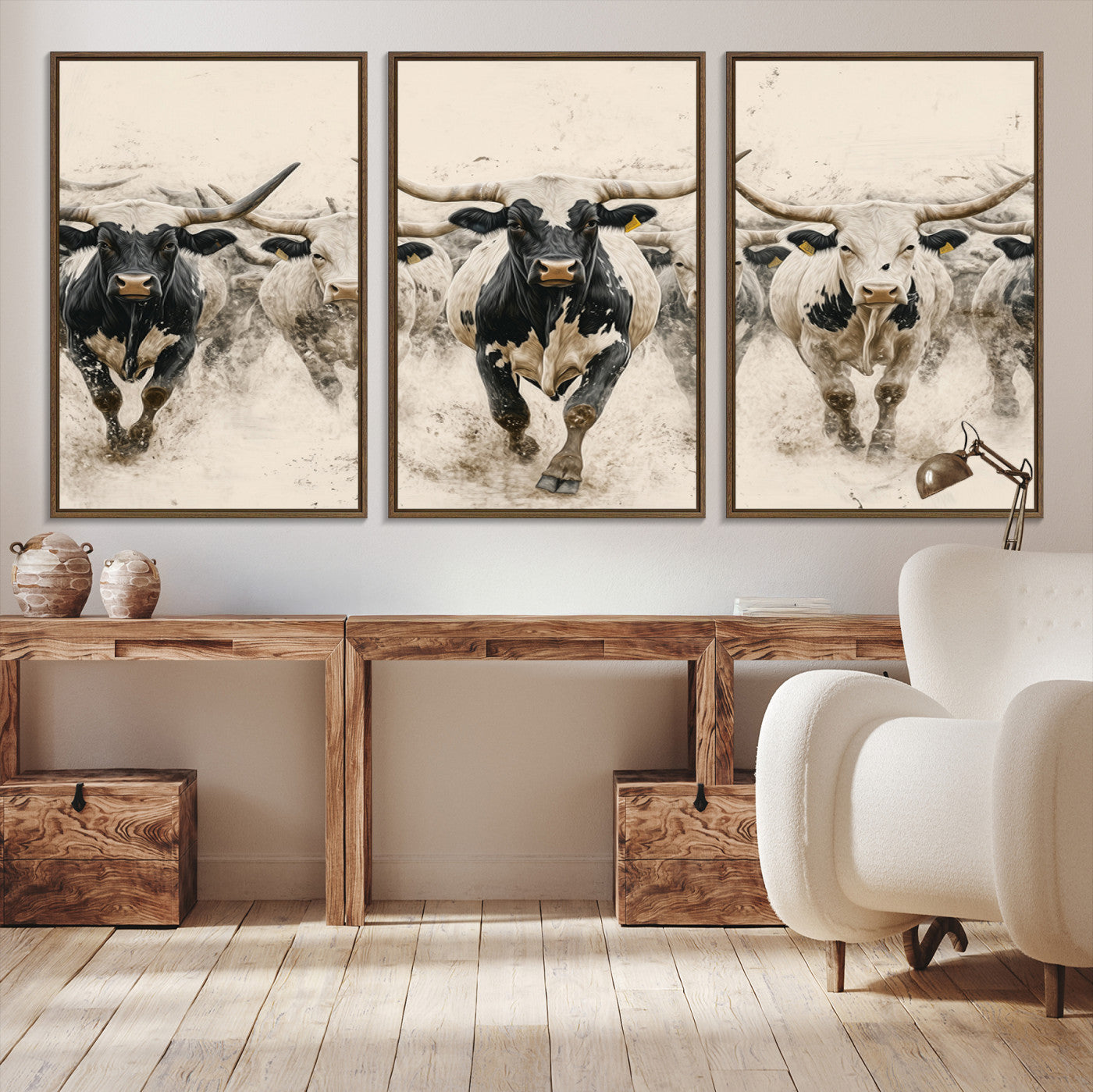 Canvas artwork of Texas Longhorn bulls walking in a dusty herd, ideal for rustic Western or country-style interior decor.