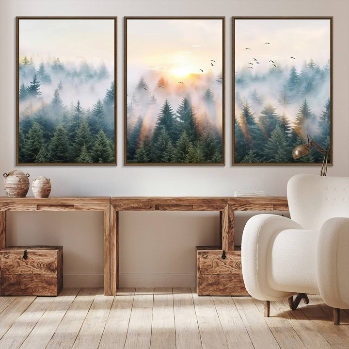 Misty Pine Forest Wall Art: A depiction of sunrise over foggy trees and birds against a bright sky; a framed woodland scene ideal for home or office decor.