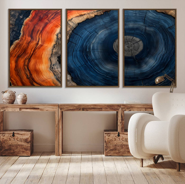 Abstract Tree Ring Wall Art Print on canvas featuring vibrant blue, orange, and brown rings with a natural rustic wood texture. Free shipping available!.