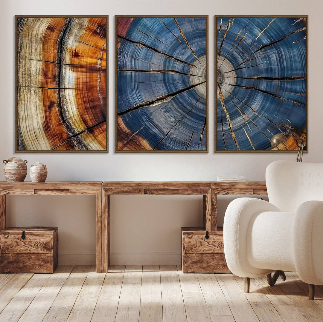 Close-up of blue, brown, and orange wood grain rings on the Abstract Tree Rings Canvas Wall Art Print.