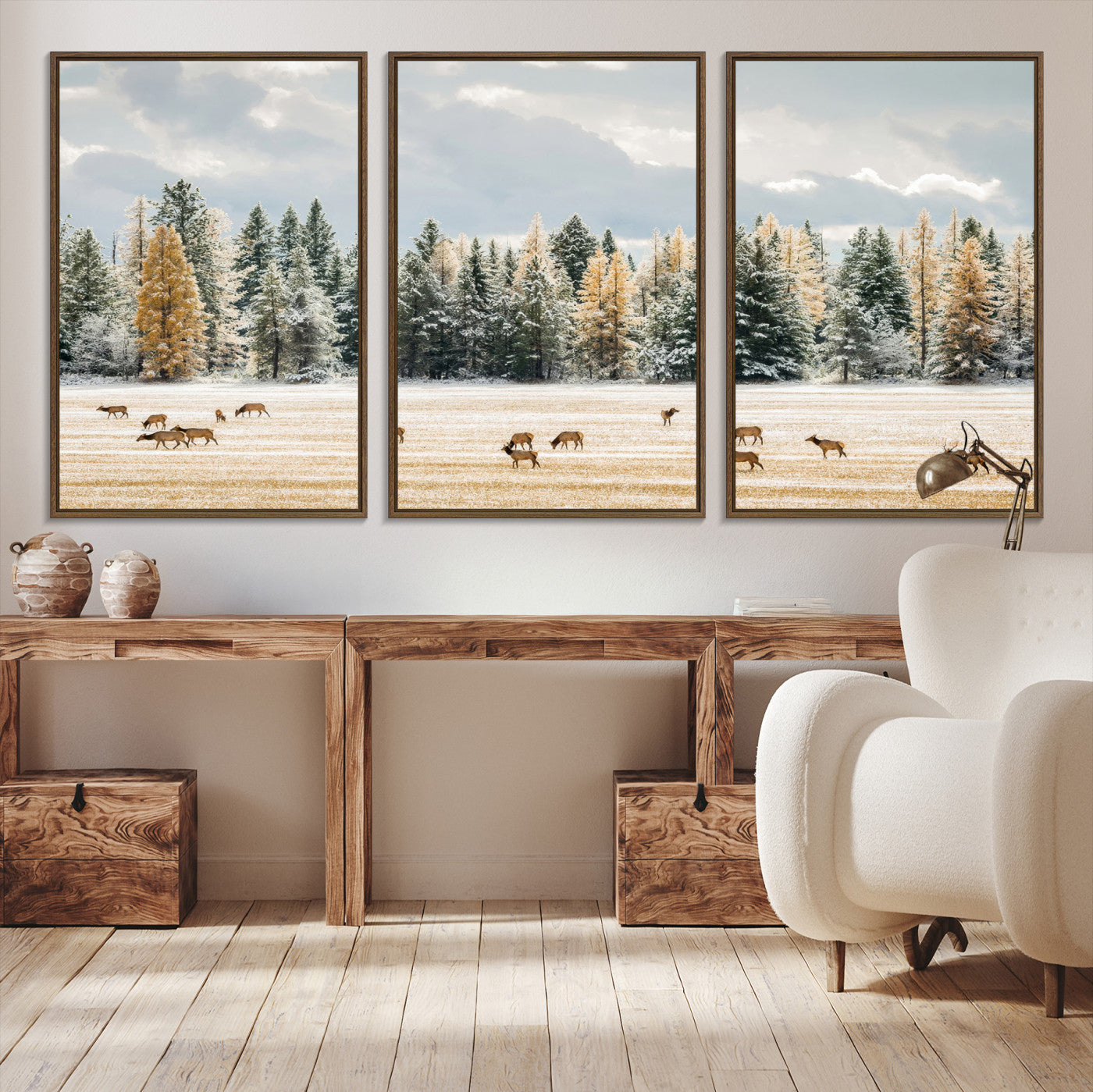 Elk herd in a snowy field with golden pine trees and frosted evergreens, ideal for neutral rustic or cabin-style home decor.