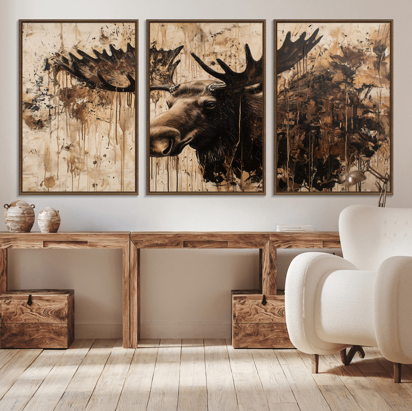 Artistic painting of a moose head with large antlers in shades of brown and black, with paint splatters and drips on a beige textured background, creating a rustic and expressive wall art canvas.