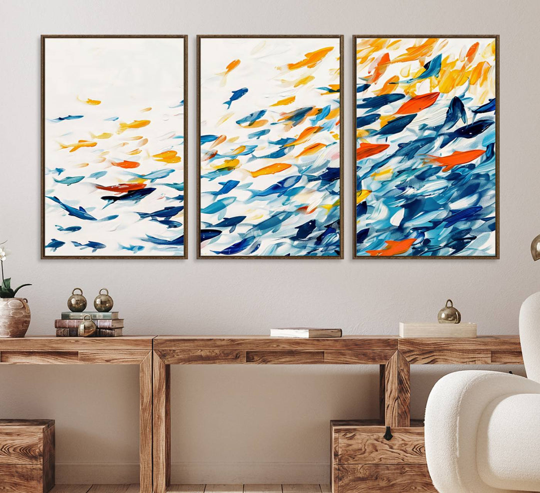 A colorful Abstract Fish Shoal Canvas Print hangs on the wall.