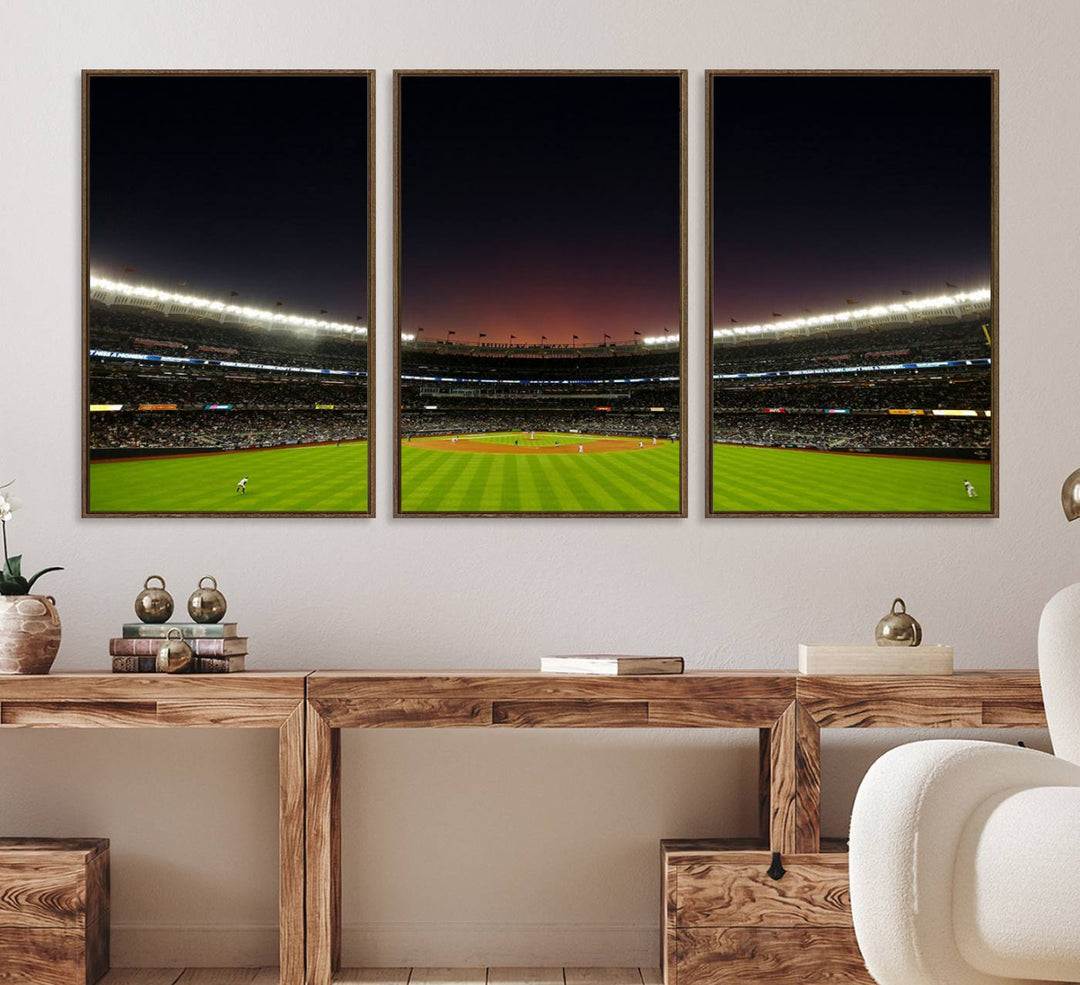 A night game at Yankee Stadium depicted on canvas beneath a sunset sky.