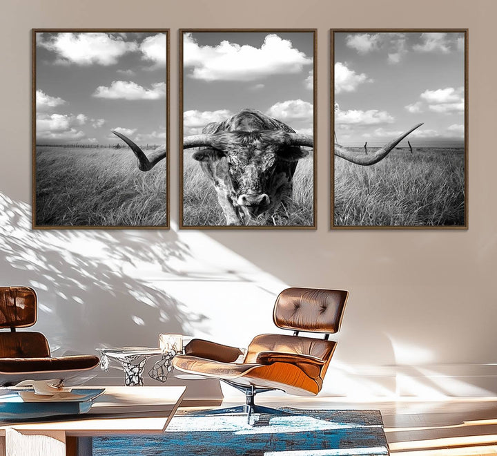 Longhorn Cow Field Canvas Print featuring rustic charm with a windmill backdrop.