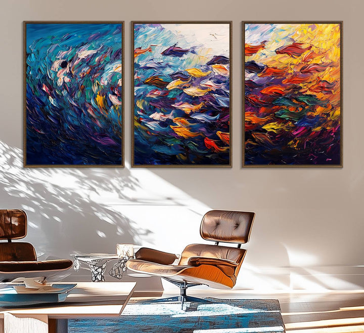 The Vibrant Abstract Fish Swarm Art features a colorful 3-piece canvas that adds a pop of color.