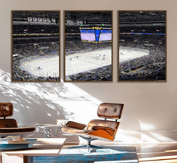 A large Enterprise Center canvas of a crowded hockey arena hangs prominently.