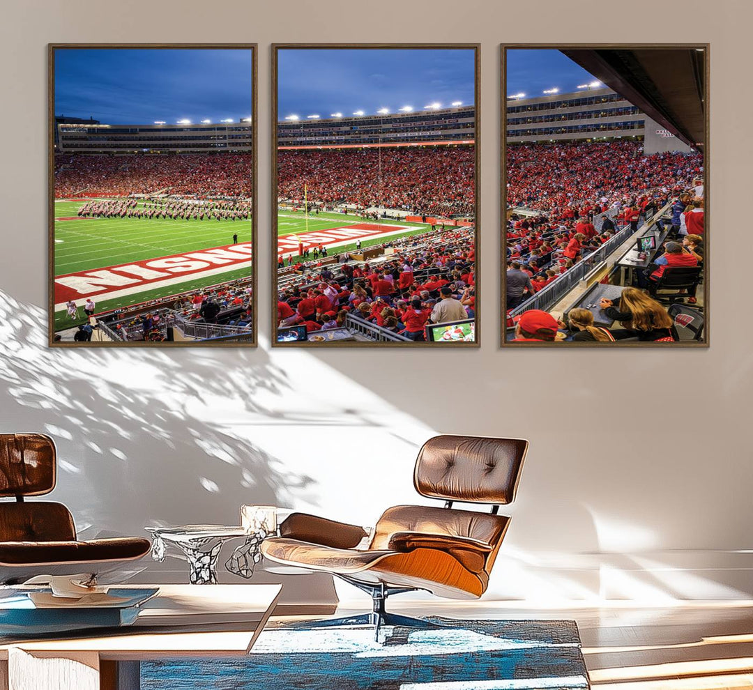 A vibrant wall art captures the essence of Madison Camp Randall Stadium, depicting a sea of fans in red and white during a Wisconsin Badgers football game under bright lights.