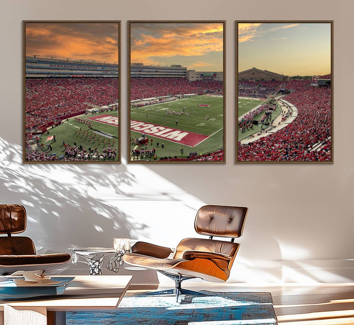 The wall features a Wisconsin Badgers wall art canvas print, capturing the vibrant atmosphere of a full Camp Randall Stadium at sunset.