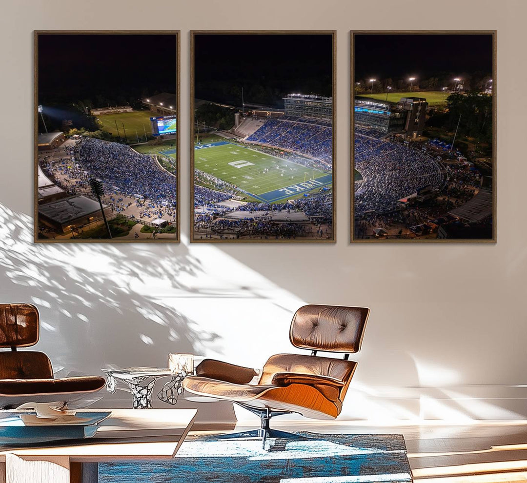 Night aerial view of packed Duke Blue Devils Wallace Wade Stadium, surrounded by trees and illuminated by lights; perfect for high-resolution prints.