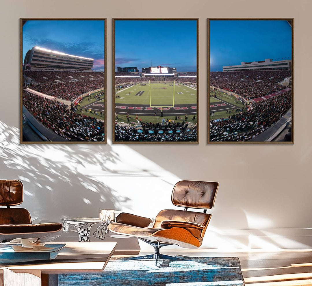 The wall art in the living room features a Texas Tech Red Raiders Football Team Print, showcasing Jones AT&T Stadium at dusk.