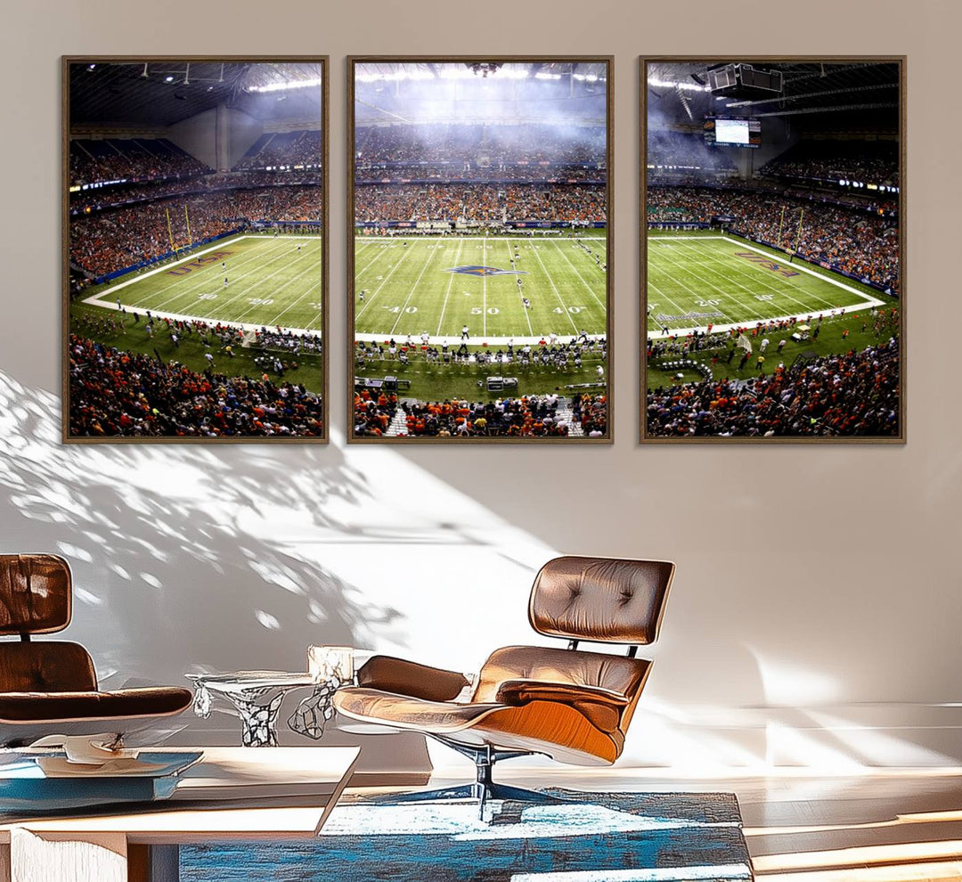 The modern living room features an Alamodome wall art canvas print, depicting a stadium filled with spectators for a UTSA Roadrunners game.