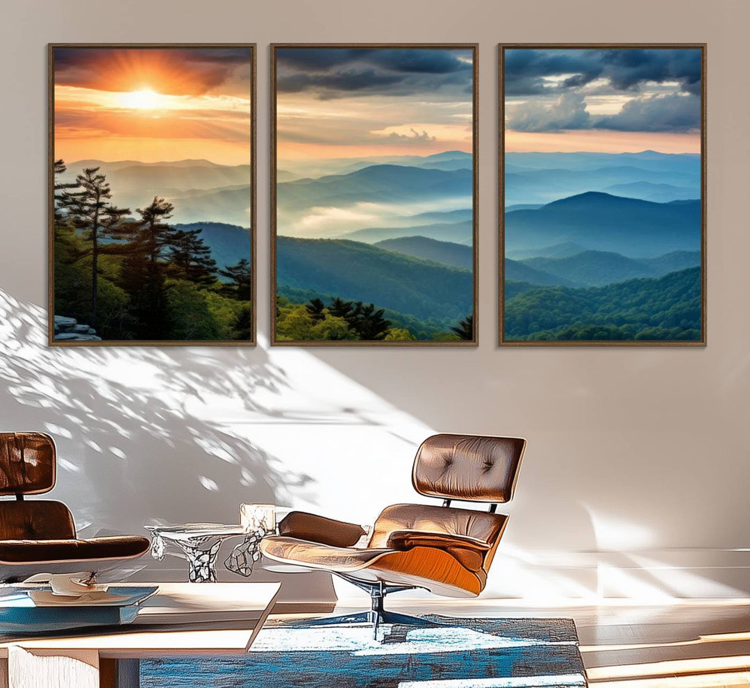 The wall art, titled Sunrise Over Mountain Range, is a canvas print that beautifully depicts layers of hills, scattered trees, and a partly cloudy sky.