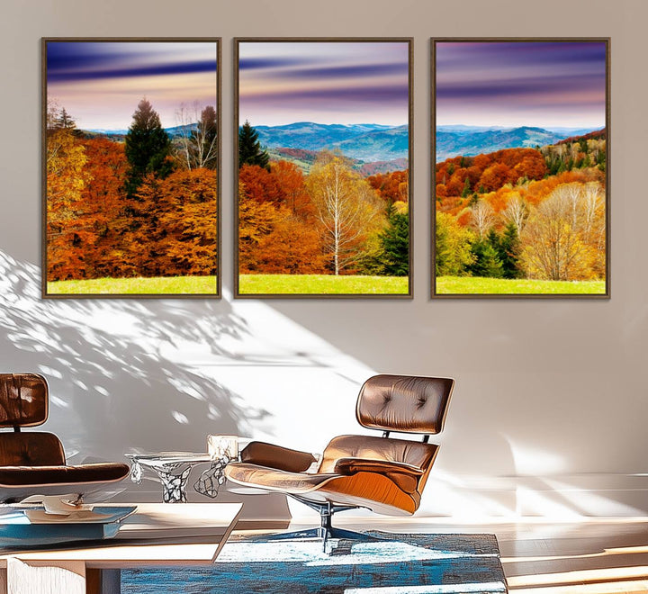 The wall art in the kitchen dining area is a large Autumn Forest Mountain Canvas Print that captures a vivid scenic landscape.