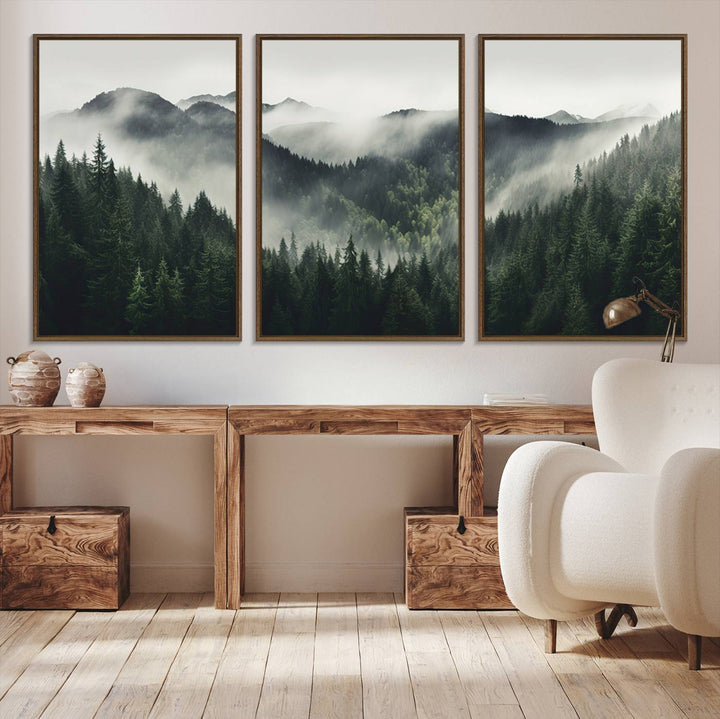 The Misty Forest Canvas Print Wall Art captures a serene misty forest scene with fog and mountains.