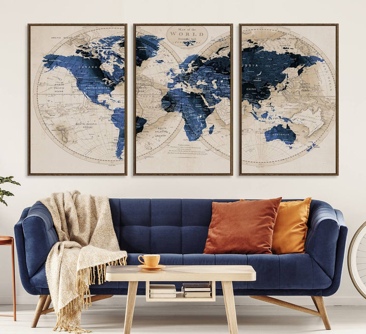 The Vintage Triptych Map Print is a grunge-stained blue and beige world map, perfect for enhancing wall decor.