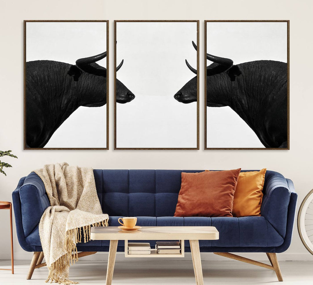 Spanish Bull Wall Art Canvas Print: Two black bull heads facing off on museum-quality canvas.