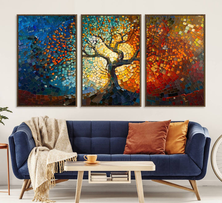 Mosaic Tree Canvas Wall Art: A stunning stained glass-inspired Tree of Life featuring blue and orange swirling patterns reminiscent of a sunburst.