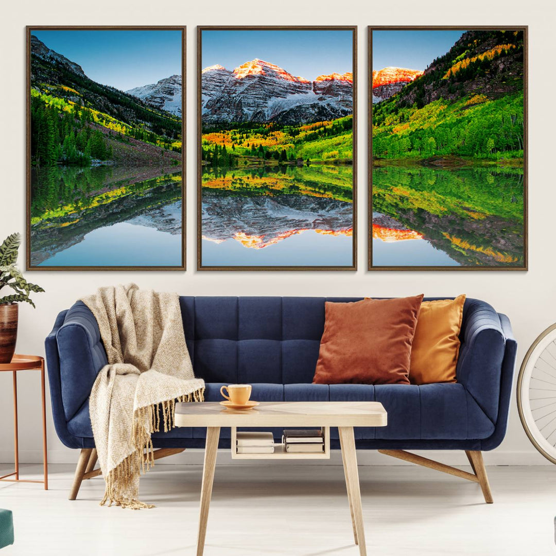 The Sunrise Maroon Bells Lake Wall Art Print beautifully captures North Maroon Peak mirrored in the tranquil lake, framed by lush greenery.