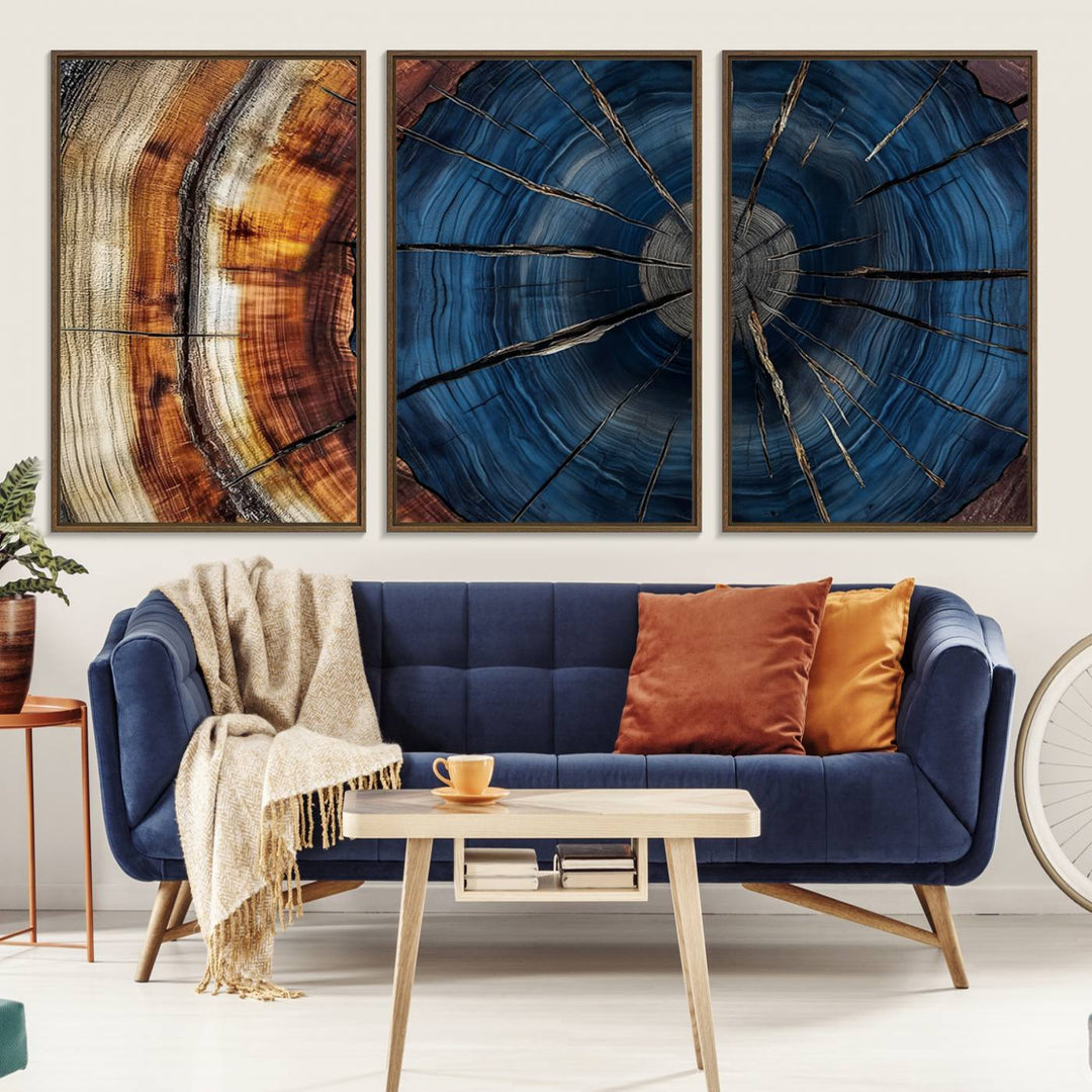 The Abstract Tree Rings Canvas Print features blue, brown, and orange rings that highlight wood grain and natures beauty.