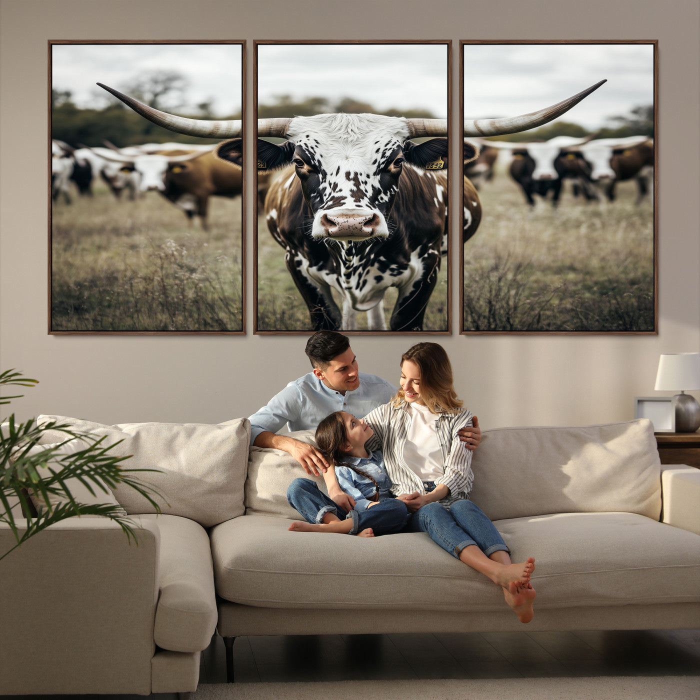 Canvas of a speckled Texas longhorn standing boldly in a field with a herd behind, perfect for rustic western or farmhouse wall decor.