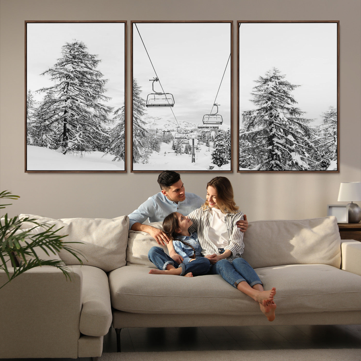 Black and white image of a ski lift amidst snow-covered pine trees, ideal for winter mountain or cabin-themed decor.