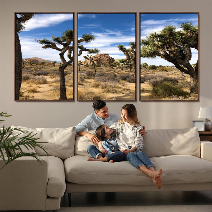 Scenic Joshua Tree landscape with rugged desert terrain, golden dry grass, and a deep blue sky, creating a warm, rustic Southwestern aesthetic.