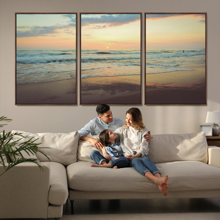 Warm sunset over gentle ocean waves with pastel sky and reflections on wet sand, creating a calm and soothing beach ambiance.
