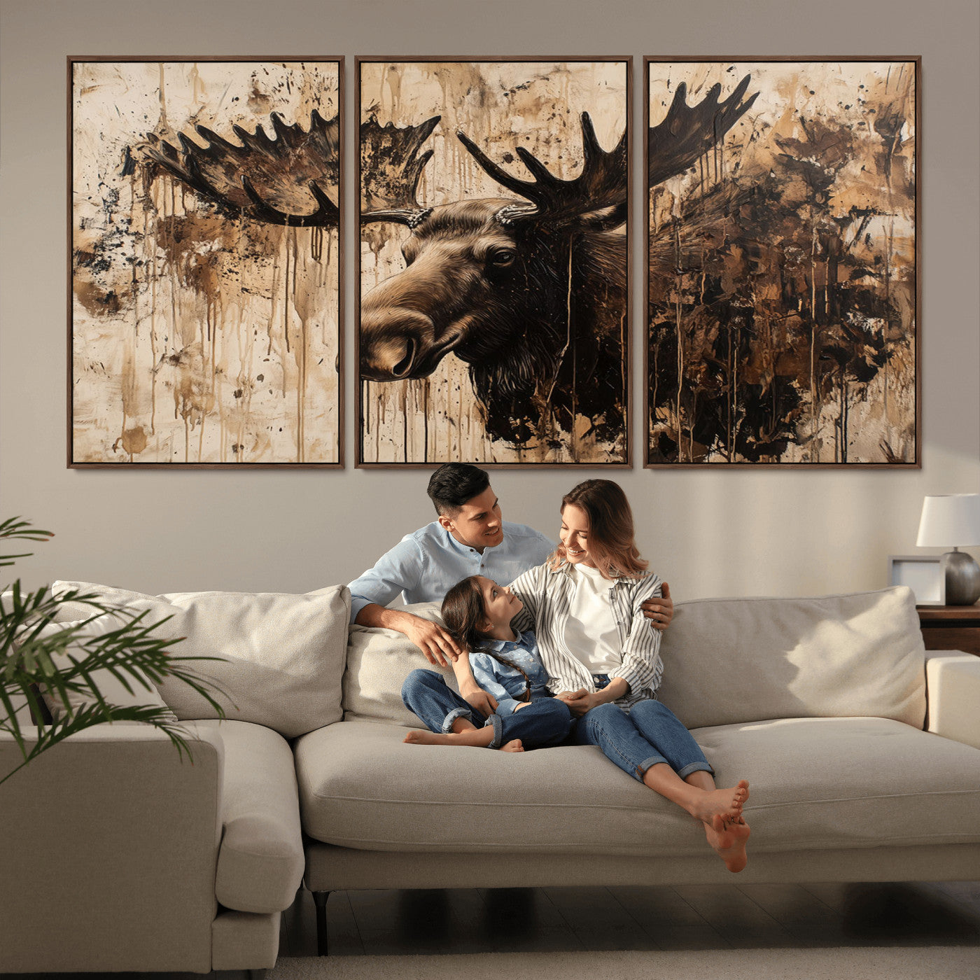 Artistic painting of a moose head with large antlers in shades of brown and black, with paint splatters and drips on a beige textured background, creating a rustic and expressive wall art canvas.