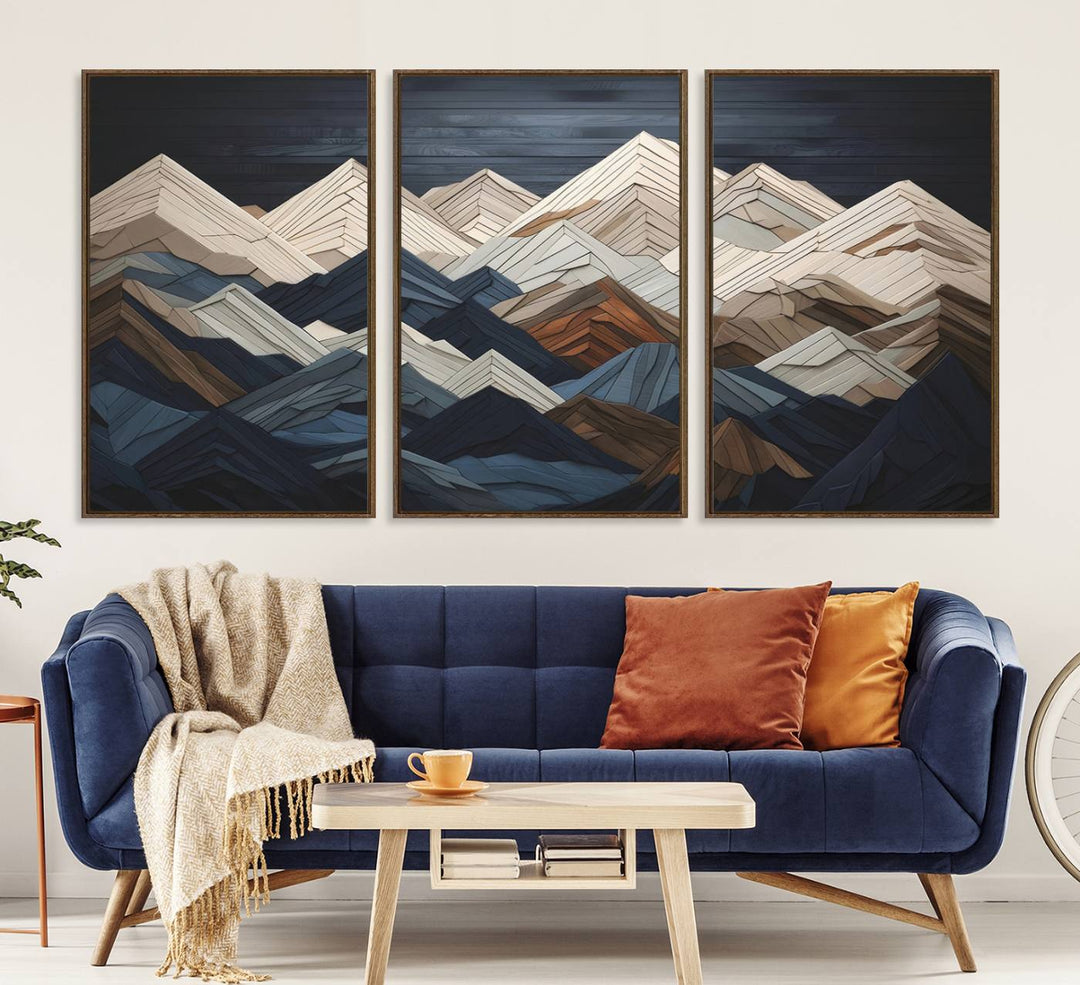 Abstract wood mountain range wall art in a 3-piece set featuring shades of blue, brown, and cream, ideal for modern rustic decor.