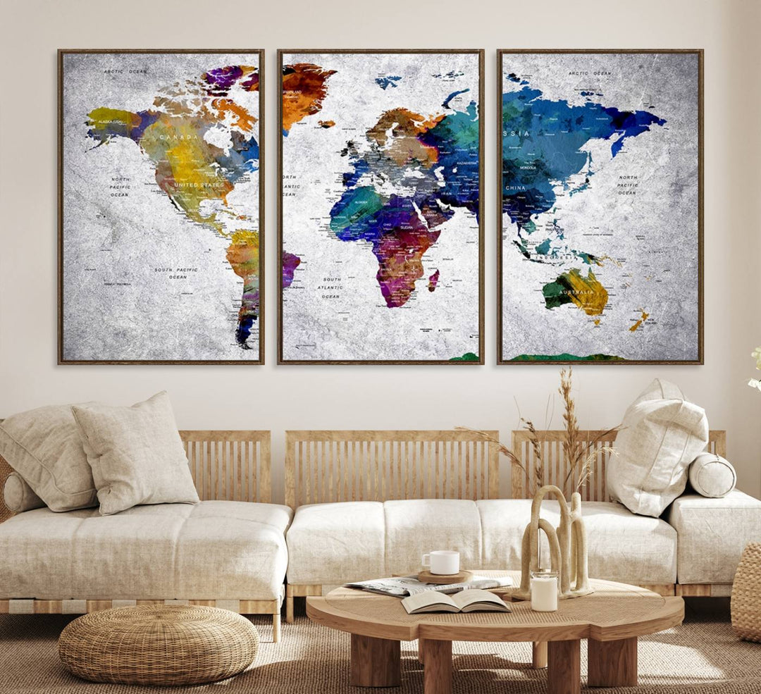 The World Map Art Canvas Print, featuring country names on a grunge-stained gray background, is perfect for stylish home decor.