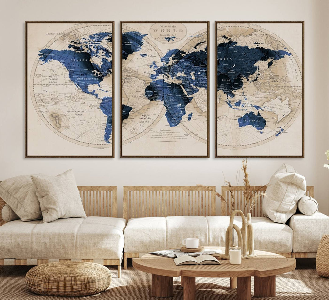 The Vintage Triptych Map Print is a grunge-stained blue and beige world map, perfect for enhancing wall decor.