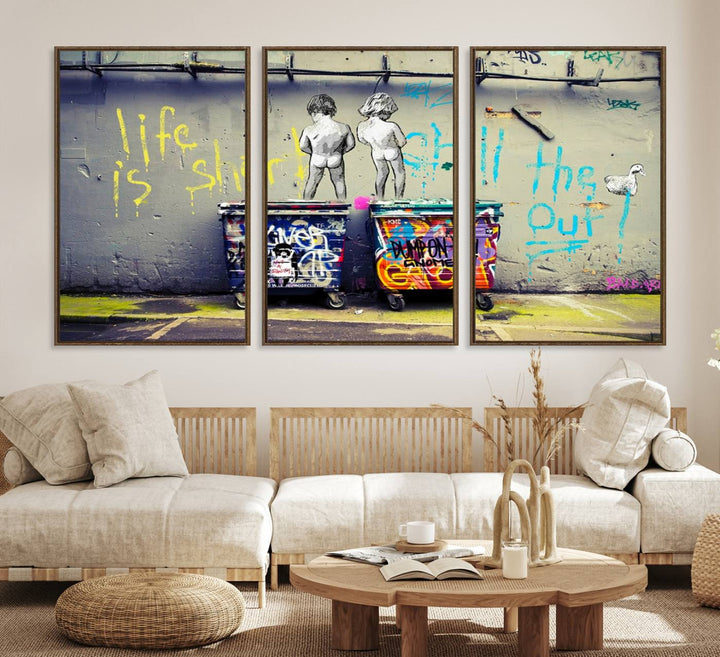 Banksys Life is Short graffiti, featuring kids and text, decorates the wall as a striking piece of framed canvas art.