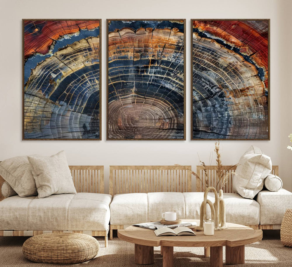 The Abstract Tree Ring Wall Art in orange, blue, and gray perfectly complements minimalist nature-inspired home decor.