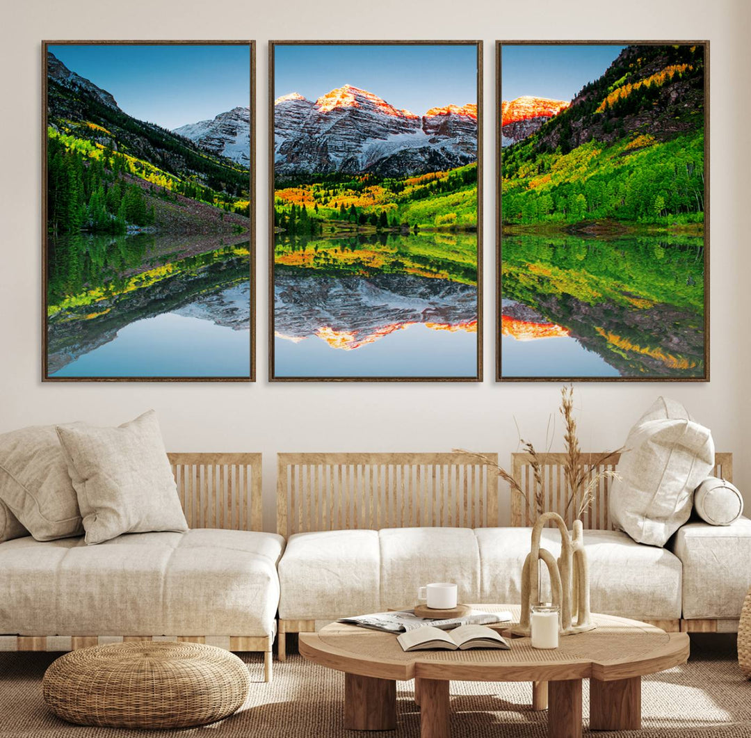 The Sunrise Maroon Bells Lake Wall Art Print beautifully captures North Maroon Peak mirrored in the tranquil lake, framed by lush greenery.