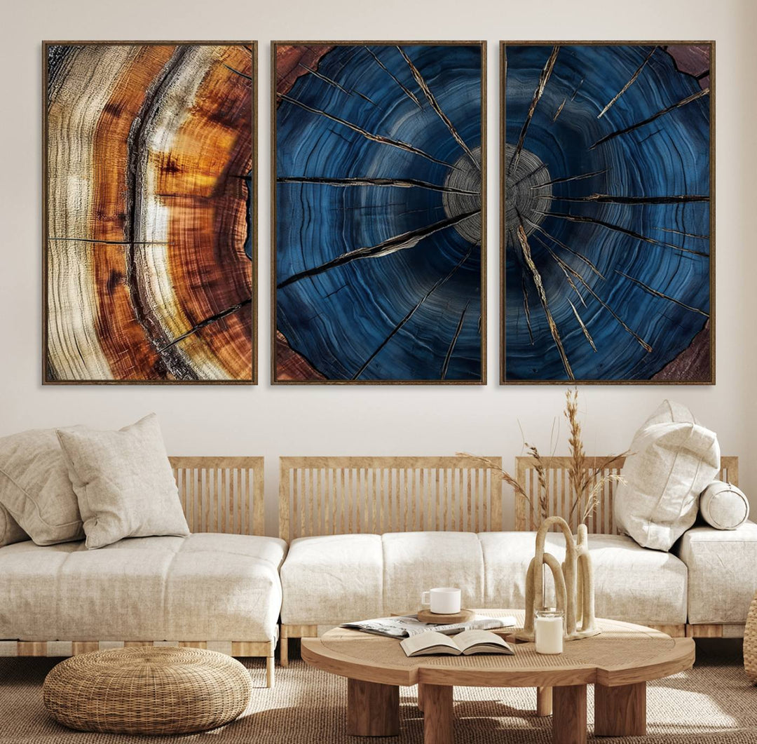 The Abstract Tree Rings Canvas Print features blue, brown, and orange rings that highlight wood grain and natures beauty.