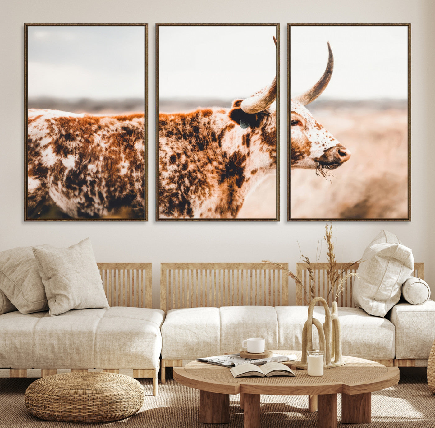 Speckled Texas longhorn with curved horns standing in a warm-toned prairie, perfect for rustic or country-style home decor.