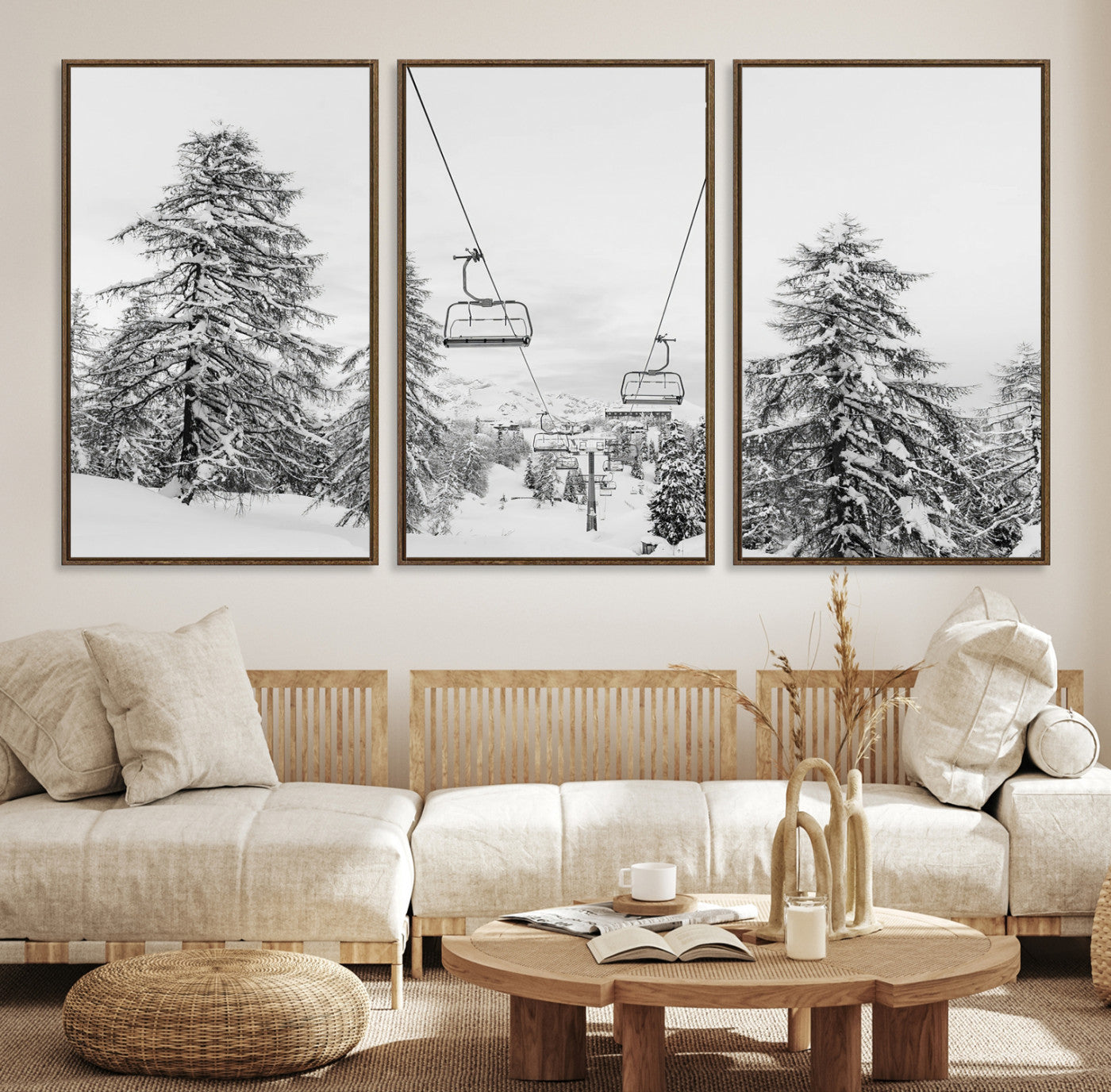 Black and white image of a ski lift amidst snow-covered pine trees, ideal for winter mountain or cabin-themed decor.