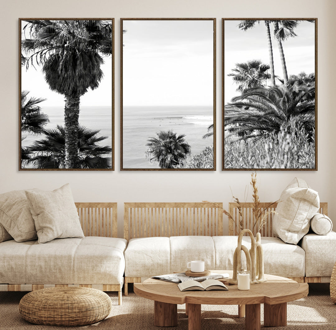 Monochrome canvas of palm trees framing a coastal surf scene, perfect for California-inspired or retro black-and-white beach decor.