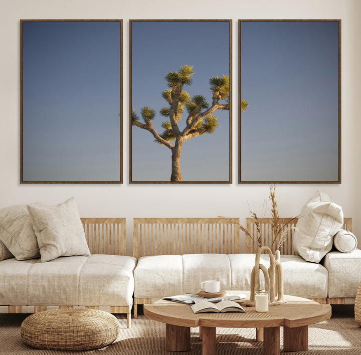 A lone Joshua Tree standing against a deep blue sky, capturing the serene and rugged beauty of the Southwestern desert landscape.