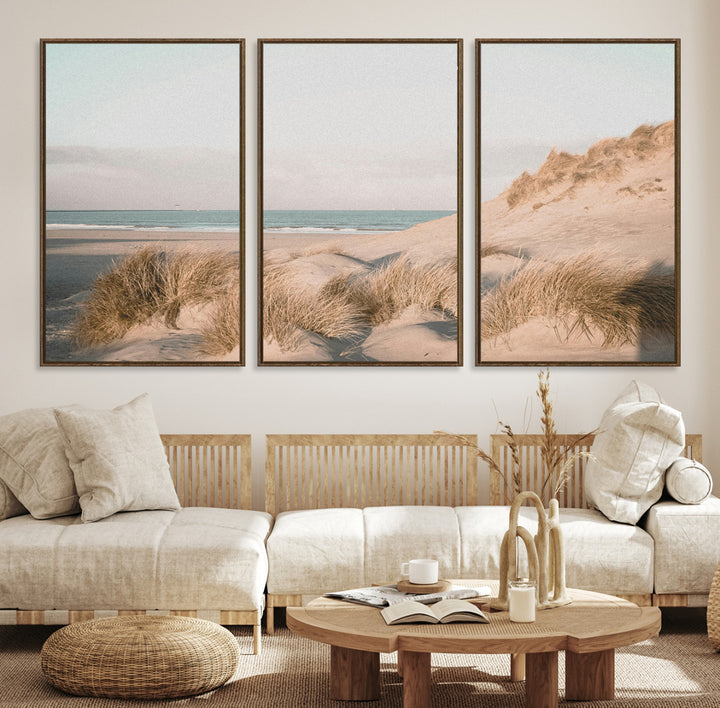Soft pastel-toned beach scene with sand dunes, windswept grasses, and a calm ocean horizon, creating a serene coastal atmosphere.