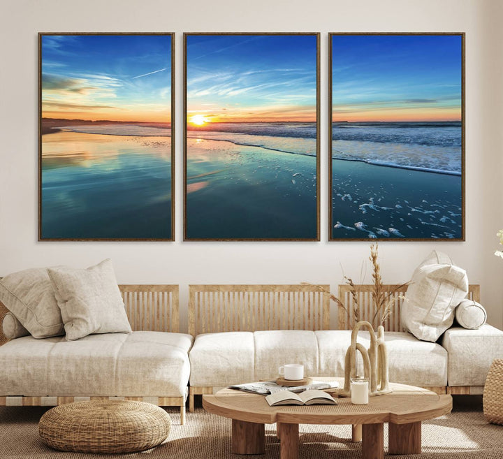 The Blue Sky and Beach Wall Art Canvas Print features a vibrant orange sky reflecting on wet sand.