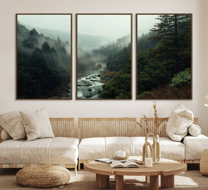 The Misty Forest Wall Art features a serene landscape with a misty river and evergreens, ideal for enhancing the ambiance of any living room or cabin.